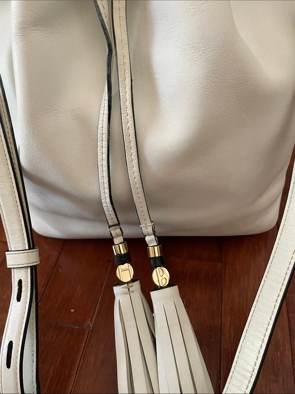 Henry Bendel White Leather Drawstring Bucket Bag with Tassel Accent - Picture 2 of 6
